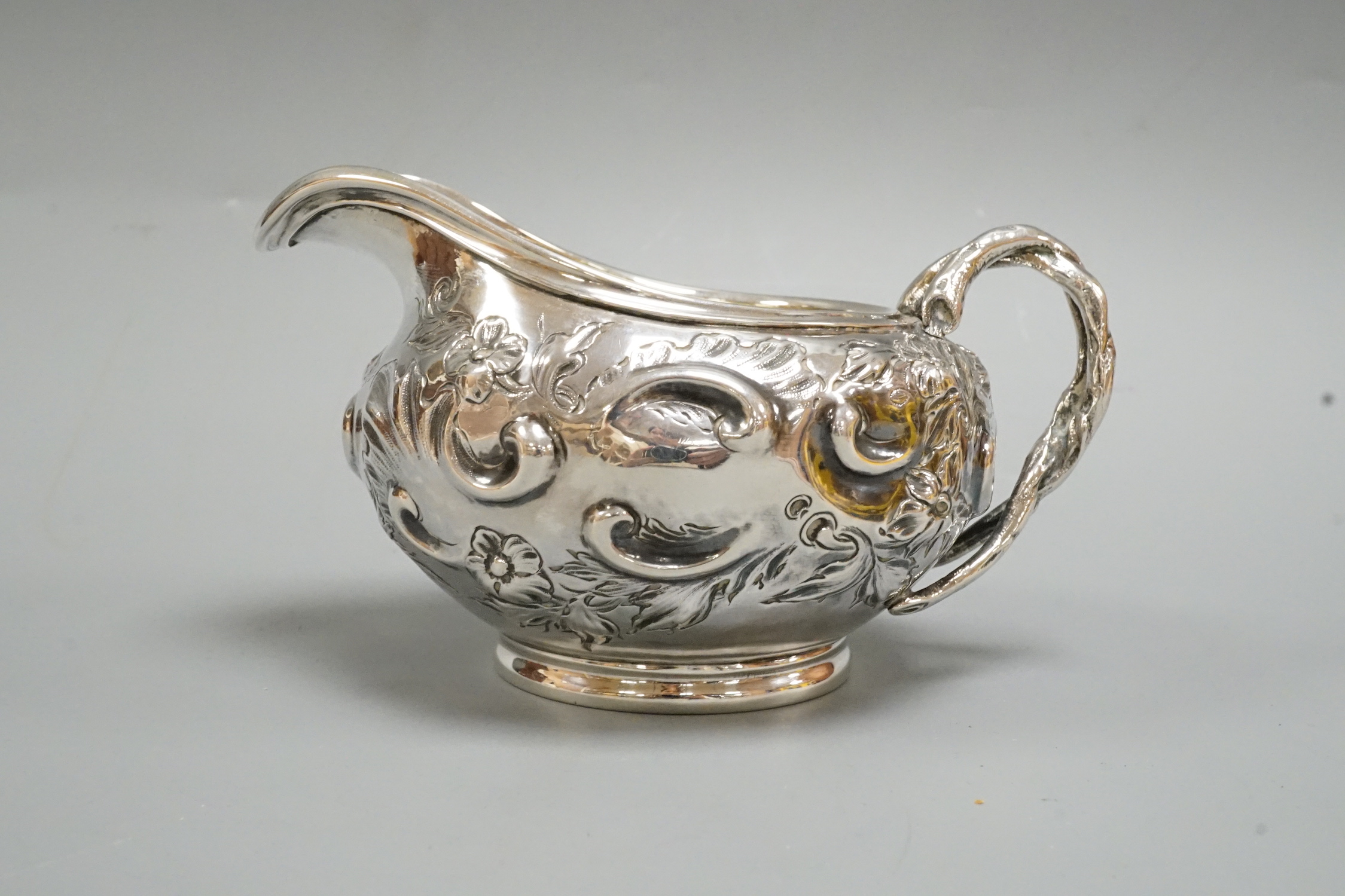 An early Victorian silver cream jug, by Charles & George Fox, London, 1844, length 14.1cm, 6.2oz.